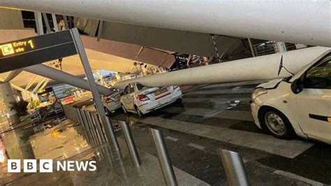 Indira Gandhi International Airport: Roof collapse smashes cars .